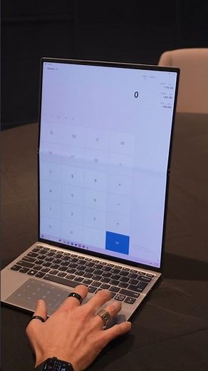 Lenovo’s concept adds light-up buttons to a trackpad for shortcuts—brightness, playback, and more.