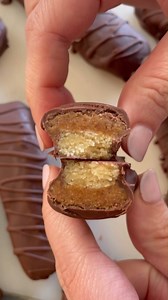 These Homemade Twix Bars are so fun and easy to make plus they’re a healthier alternative to one of everyone’s favorite candy bars! The shortbread crust is gluten-free and only requires a few simple ingredients while the “caramel” filing is made with almond butter and higher in protein than the original candy. These are a great treat and something you’ll find yourself making on repeat! Ingredients For the shortbread: 1 1/2 cups of almond flour, packed (200g) 3 tablespoons of butter, melted 1 1/2