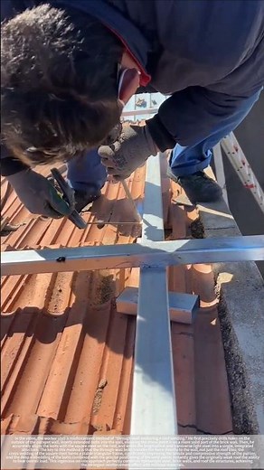 A single screw pierces the wall, instantly transforming the roof into a stable structure.