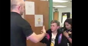 5th grade teacher does personalized handshakes with each student