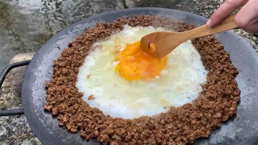 Scrambled ostrich egg with meat