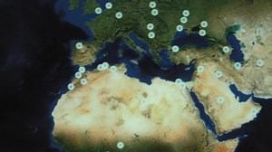Download World map with different targets for cyber attack. Hacking and technology concept. Macro shooting at monitor pixels