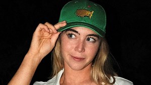 Grace Charis gets in Masters mood as she goes braless in open jumpsuit