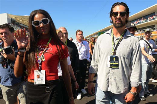 Gabby Thomas turns heads in chic black and white look at Alexis Ohanian's Athlos Times Square long jump event with fiancé Spencer McManes