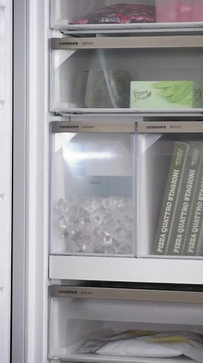 The pull-out IceTower by Liebherr sets a new standard in the cooling industry. It combines two large storage options: the automatic IceMaker for up to 5.7 kg of ice cubes and an additional spacious compartment, large enough to store a few family pizzas upright, for example. Plus, to ensure everything can be found easily at these dimensions, we have also provided lighting for our IceTower. Learn more at Home.Liebherr.com | Liebherr Appliances ZA