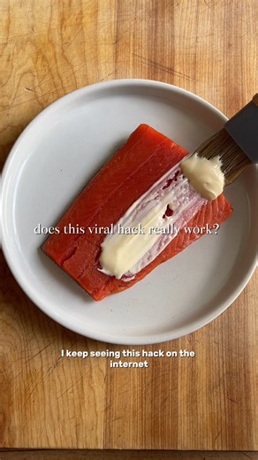 We tested out a mayo salmon air fryer hack that has been coming up on our feeds. The verdict? It's a great way to cook flaky, juicy fillets for weekday meals. To try it yourself, simply brush a fillet of wild salmon with a generous layer of high-quality mayo, then air fry it. The mayo clings better than olive oil as the fish cooks, giving you excellent results every time. #airfryerhacks #airfryersalmon #wildsalmon #alaskansalmon #mayo | Wild Alaskan Company