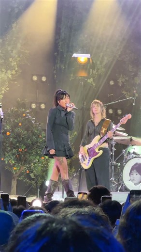 1.8K views | Still buzzing from beabadoobee's incredible Outdoor Mini-Concert at Jimmy Kimmel Live! ✨ Her mesmerizing vocals and stage presence lit up the night, and the crowd was loving every second. We can't wait for even more Outdoor Mini-concerts! Who would you like to see perform? #beabadoobee #JimmyKimmelLive #Concert #LosAngeles | 1iota | Facebook