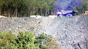 Coal Truck Crashes Over Bank