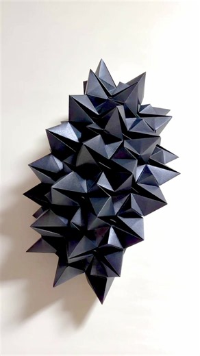 Origami;The torment - Metallic Black (ASMR) I made it from a piece of paper and didn’t cut any part of paper to create it. I designed it myself. My artwork is available on my web store(Link in my bio). #origami #geometric #asmr #折り紙 #black