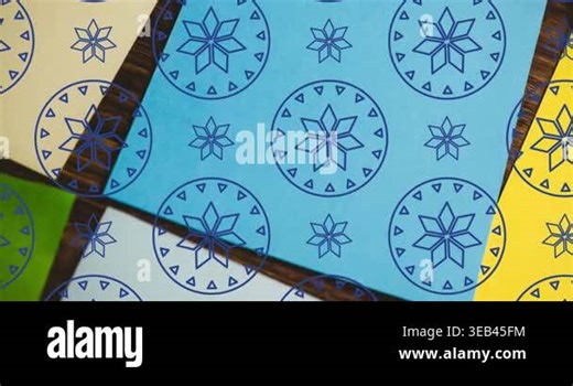 Animation of floral pattern in circles, question mark over multicolored paper on table. Digital composite, multiple exposure, art, design, craft, vector and abstract concept Stock Video Footage - Alamy