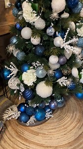 Blues and Whites give this tree a beautiful lush look. All ornaments on our trees are for sale. | Rustic Cabin Decor