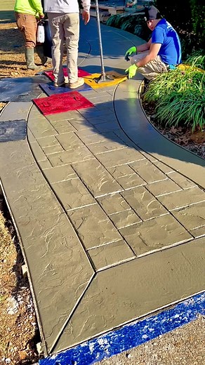 Stamped Concrete Walkway with Hand-Tooled Borders