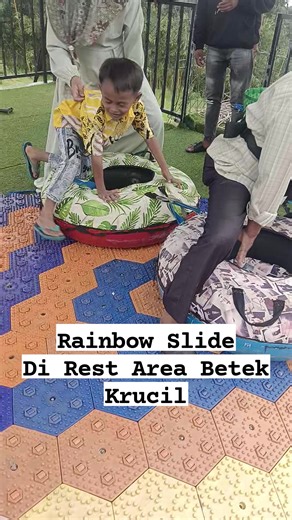 Ahmad Sidiq | “Berani naik Rainbow Slide? Sekali meluncur, nagihhh 😆🌈” Seru-seruan sejenak di Rainbow Slide Rest Area Betek Krucil 🌈 Nggak cuma... | Instagram