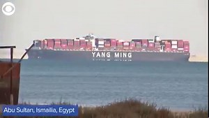 TRAFFIC JAM: Large container ships were lined up on both sides of the Suez Canal waiting to get through Friday. | WJZ-TV | CBS Baltimore