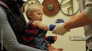 Baby boy gets a cast at clinic