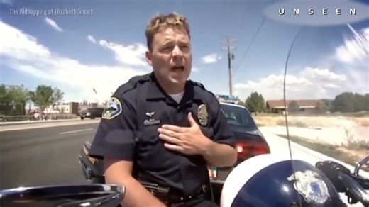 She was taken at knifepoint and police walked past her