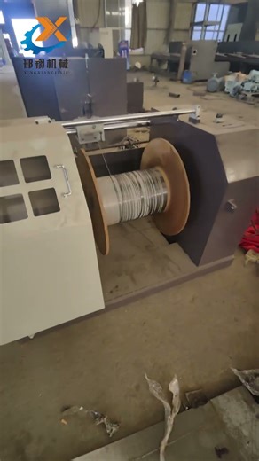 Pre-delivery testing of the straight-through wire drawing machine.