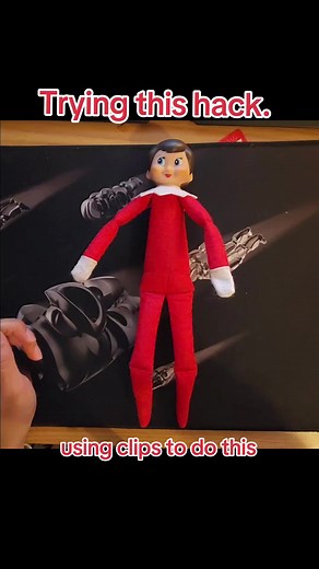 using clips to make the elf easier to hang or to grab something. Not so easy to pass thru the elbows and knees. #elfontheshelf #ElfonTheShelfIdeas #Elfontheshelfhack #Christmas #Magic #itsthemostwonderfultimeoftheyear #elf #theelfontheshelf #theelf