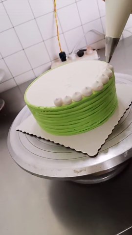 Enhancing Avocado Green With Fruits Icing Cake