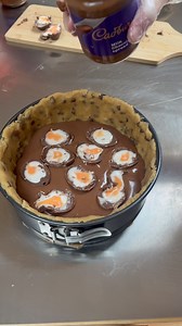 Building the ultimate Easter treat! 🐣🍪 A thick, gooey cookie pie stuffed with Cadbury Creme Eggs… who’s ready for this? 🤎 #EasterBaking #Cadburys #CadburysCremeEgg #CremeEgg #WhenCookieMetBrownie #CremeEggLover #CookiePie #GooeyGoodness #BakingMagic #FoodieHeaven #EasterTreats #SweetToothFix #HomemadeHappiness #instabaker | When Cookie Met Brownie