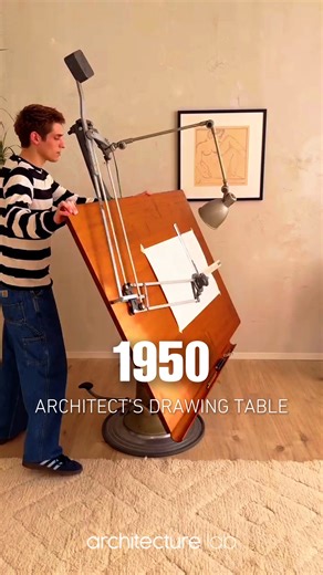 Architect’s Drawing Table, produced in the 1950s by Nike Eskilstuna in Sweden, represents the standard working surface of the pre-digital architectural studio. Built around a cast-iron base with adjustable height, full rotation, and a tilting tabletop, the table was designed to support large-format drawings, prolonged drafting sessions, and precise manual control. Integrated lighting and mechanical adjustability positioned the table as both instrument and workspace, allowing architects to calibr