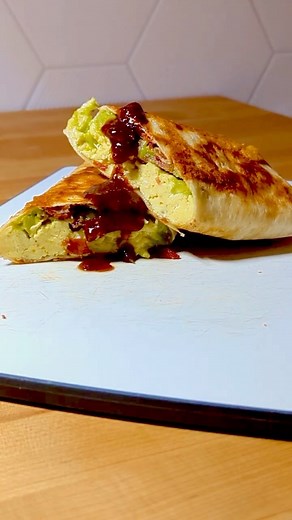 🔥Loaded Breakfast Burrito! 🌞 Happy Monday, Cut Da Carb Fam! 🎉 Kickstart your day (or wrap up your night) with a breakfast burrito that’s loaded to the brim with all the good stuff - Bacon 🥓, Eggs 🍳, and Avocado 🥑! It’s the protein-packed meal you didn’t know you needed! Perfect for ANY time of day, just like Justin savored it for dinner! Crispy, scrumptious, and oh-so-filling! 👨‍🍳 @ElectricMice the creator of this amazing Burrito, says breakfast burritos aren’t just for breakfast, and we