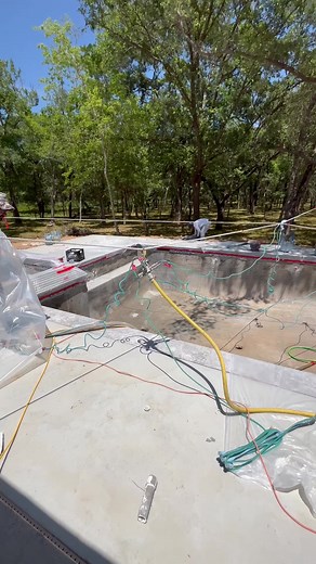 Check out this BEAUTIFUL Swimming Pool! This Pool was plastered in Prism Matrix Índigo Blue by Wet Edge Technologies for our pool builder customer, Patterson Builders! #poolplaster #plastering #plaster #gunitepool #pools #swimmingpool #poolconstruction | JR Pool Plastering&Tx Gunite