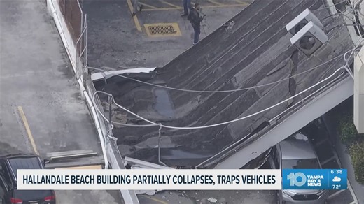 A Hallandale Beach building partially collapses and traps two vehicles