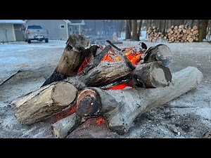 Big-log-burning day-long up-to’s campfire session- a good cold day by a big fire.