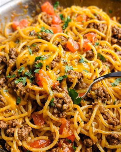 Cheesy, zesty, and full of Tex-Mex flavor—this Taco Spaghetti Recipe is a fun twist on pasta night. With seasoned ground beef, salsa, and plenty of melted cheese, it’s a hearty one-pot meal the whole family will love. ................... Full Recipe in Coʍmеոτ 💬 | Donerecipe by Sarah