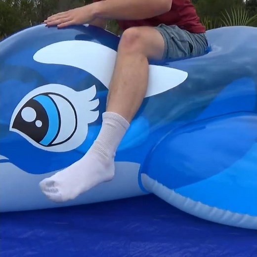 Bouncing atop Giant Inflatable 3-Meter Whale Pool Toy