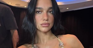 Fans React to Dua Lipa Wearing Shiny Gold Corset With Fishnet