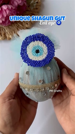 Scrapbooks | Hampers | DIY | PR Crafts | on Instagram: "Try this easiest DIY evil eye Shagun gut 😉.. Follow @pr_crafts_ for more 🎁.. #prcrafts❤ #featured #shagunariyal #weddingdecoration #weddingdecorationideas #nariyalpacking #nariyalpackingideas #trendings #shagunnariyalpacking #explorepage #weddingshagun #evileye"
