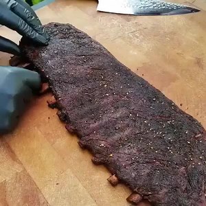 19M views · 33K reactions | We can't stop watching these smoky ribs...no bones about it!  CREDIT: @sasquatch_bbq on Instagram! | Food Network | Facebook