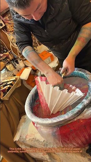 "Marbling Paper Umbrella: Traditional Hand-Dyeing Art in Action"