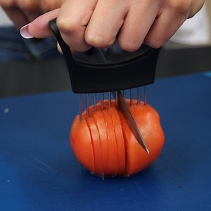 9.7M views · 7.2K reactions | This holder lets you slice vegetables with ease. 勒 If you want to buy one, use this link. We'll make some money to support our videos: https://insder.co/VegetableSlicer. | Insider Kitchen | Facebook