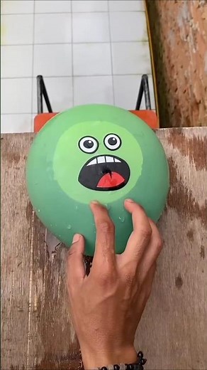 Experiment: Will the emoji water balloon explode if dropped from a height?