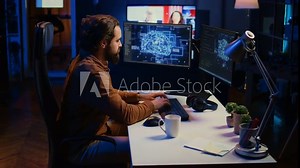 Computer scientist writes code on PC to visualize artificial intelligence neural networks. Remote IT worker runs AI script for information processing from personal office, camera B