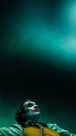 🍿 on Instagram: "Joker (2019) doesn’t feel like a comic-book movie—it feels like a reflection of the world we live in. Through Arthur Fleck, the film exposes loneliness, neglect, and a society that stops listening until it’s too late. The chaos isn’t born overnight; it’s created by everyday cruelty, silence, and broken systems. That’s why this film hits so hard today. It reminds us that when empathy disappears, reality itself begins to look disturbing—and frighteningly familiar. #joker#cinema#i