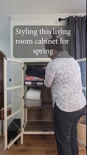 Feeling it while I fill it with these spring throw quilts! The florals and textures are just what this cabinet needed. #ReelsScrool #February #interiorstyling #springdecor | Vintage White Farmhouse