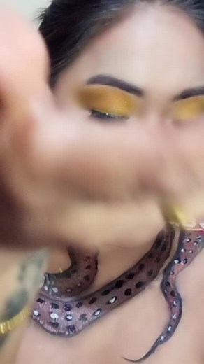 Intricate Snake Body Painting on Chest and Neck