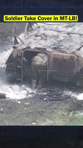 Russian Soldier Seeks Shelter in Burning MT-LB as Drone Watches