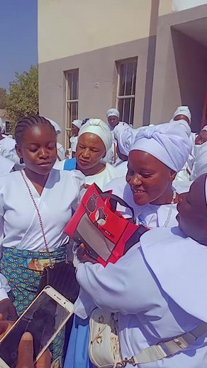 Social Gathering in White and Blue Attire