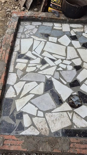 The tile installation was shoddy, and they were impressed by the floor drain.