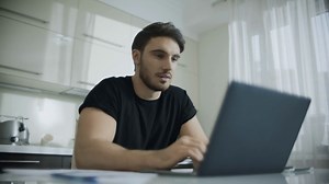 Happy Man Chatting Online On Laptop Computer Stock Footage SBV-333993128 - Storyblocks
