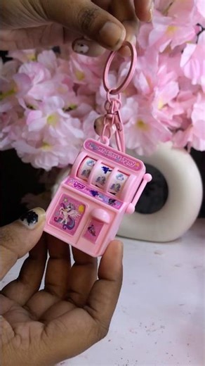 Meesho cute mini spin machine key chain that actually spins 😍😳