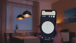App controll via Ipad - LED lights turned on and changing colors with a touch of a hand or a remote controller. Customizable lighting at your fingertips | Premium Stock Video Footage