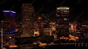 Tampa, United States - 01 February 2025: Aerial view of downtown tampa skyline featuring the regions building and rivergate tower illuminated at night, Tampa, Florida, United States.