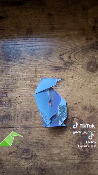Replying to @dansaysello This is an easy to make Origami Penguin. #origami #foryoupage #penguin #tutorial #pinguino #origamipenguin #dyi #foryou #easytomake #penguins