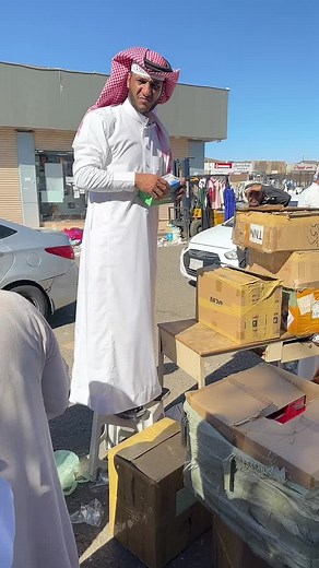 Unboxing New Smartphones in Traditional Attire